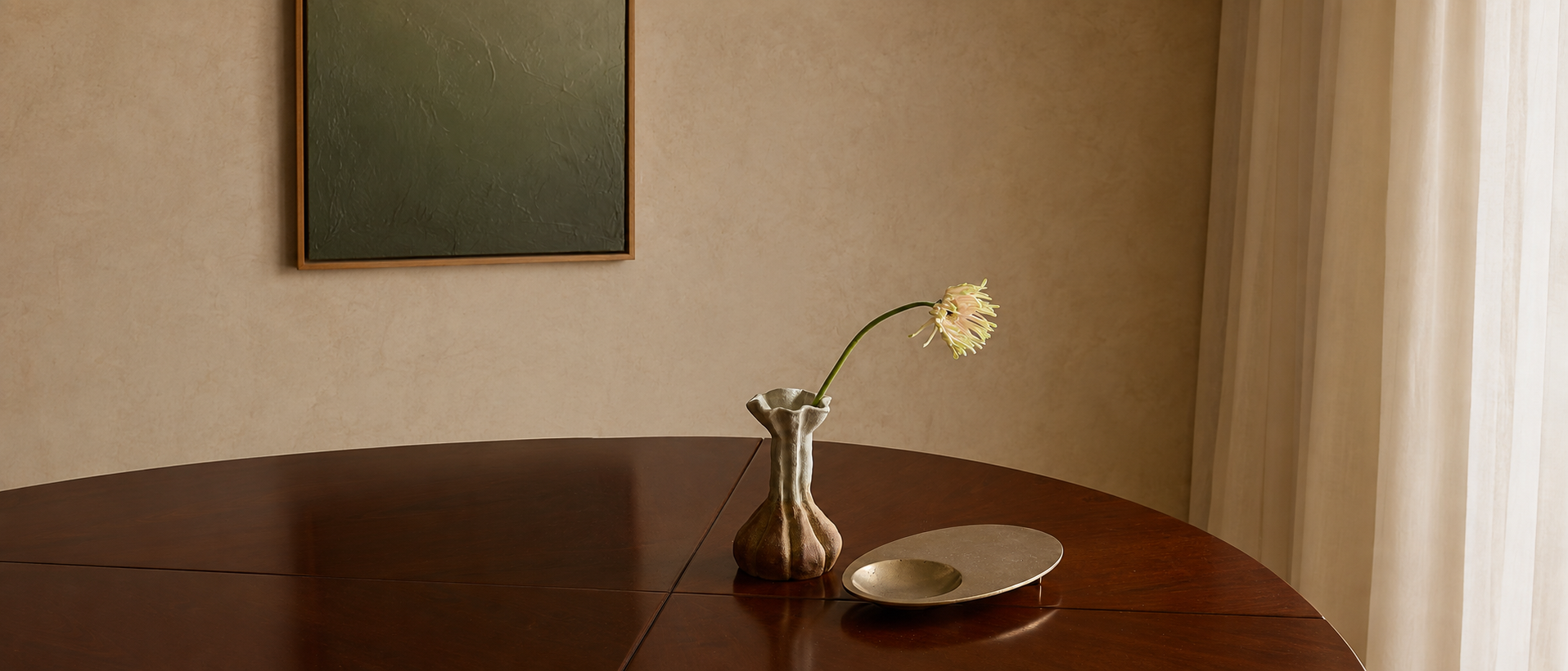 A wide interior scene featuring understated decorative accents
