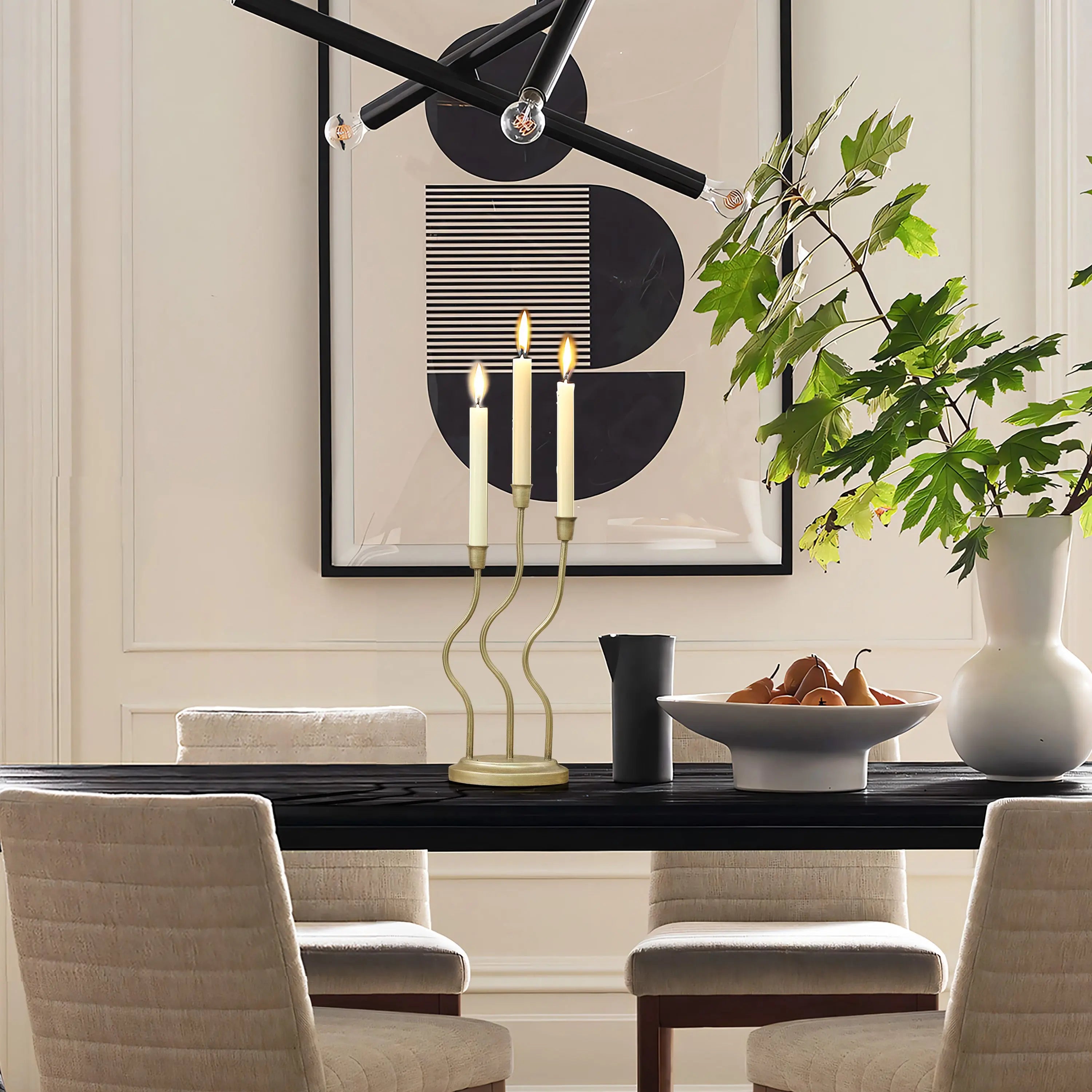 Candle stands styled within a calm interior