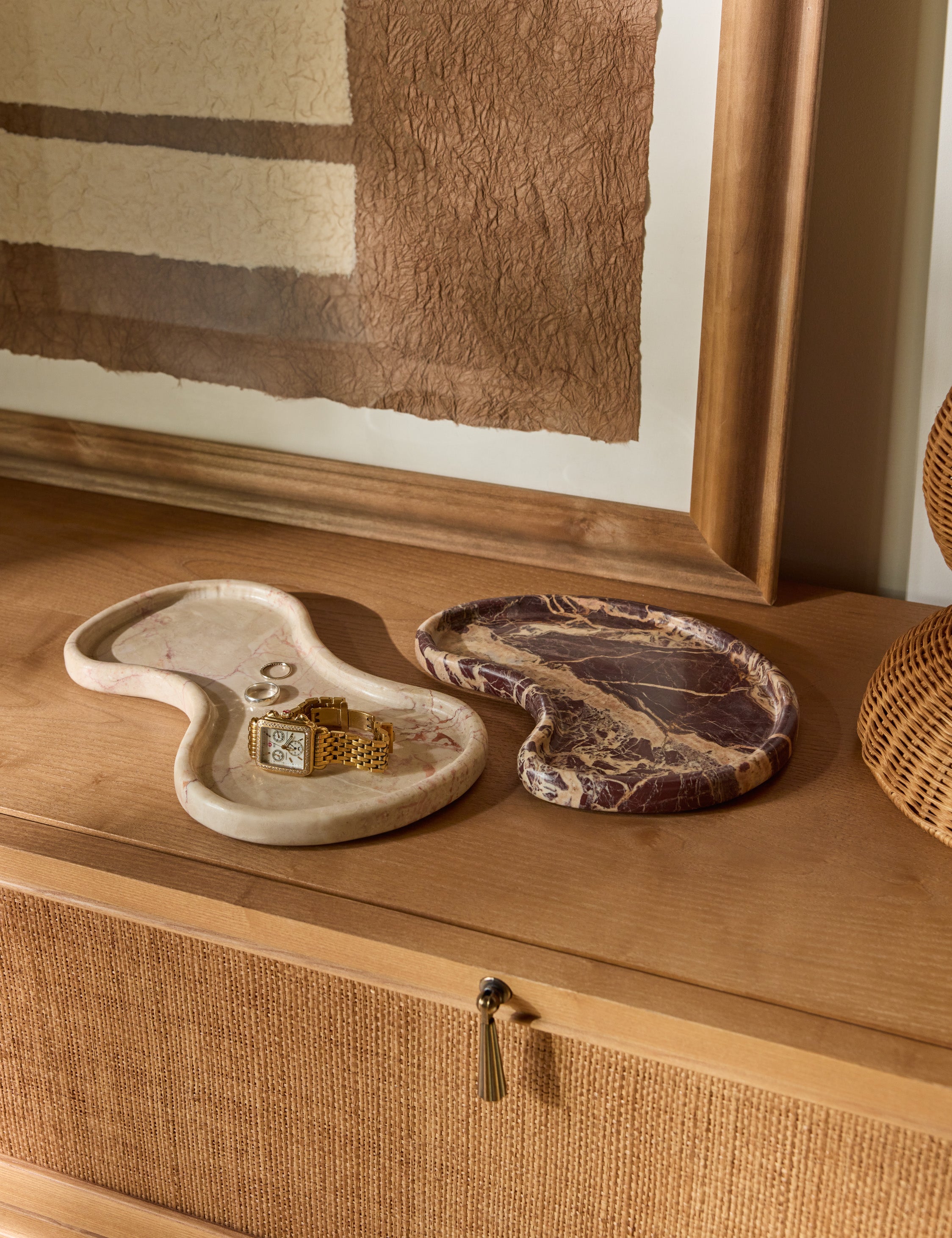 Decorative trays and boxes styled in a considered interior